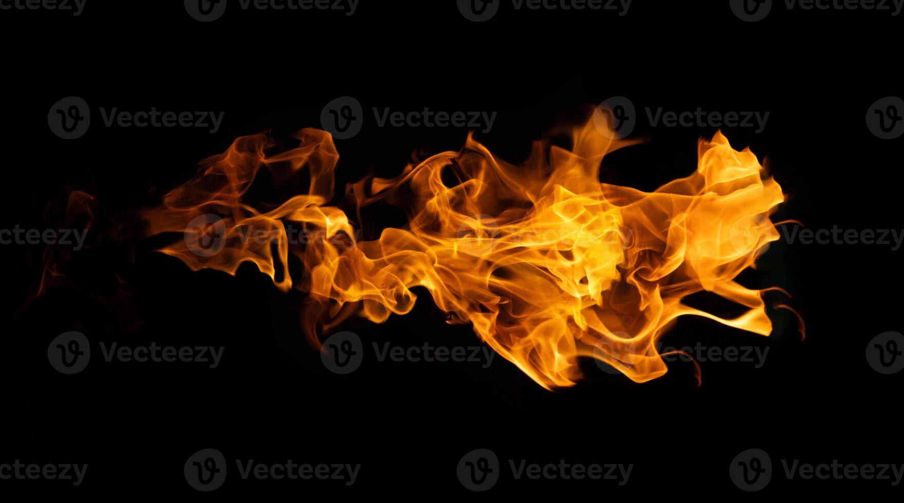 Fire and burning flame of explosive fireball isolated on dark background for graphic design photo