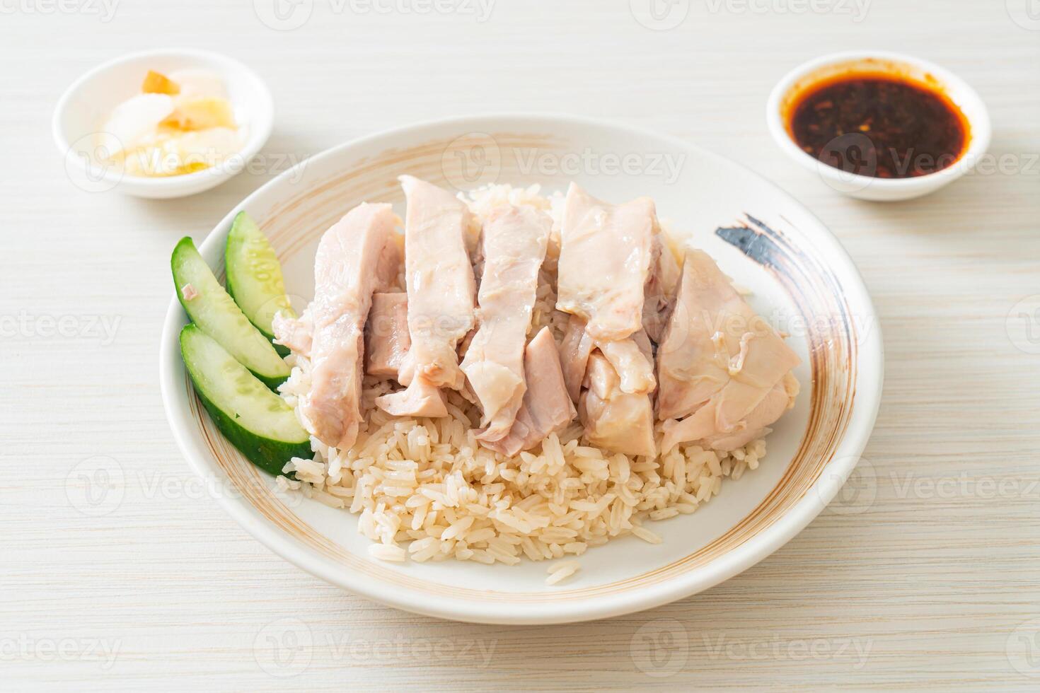 Hainanese chicken rice or rice steamed with chicken soup photo