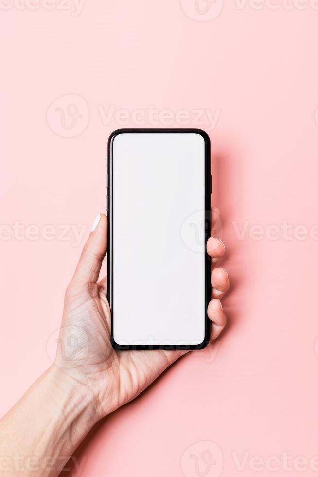 AI generated Hand Holding a Smartphone With a Blank Screen Against a Pastel Pink Background photo