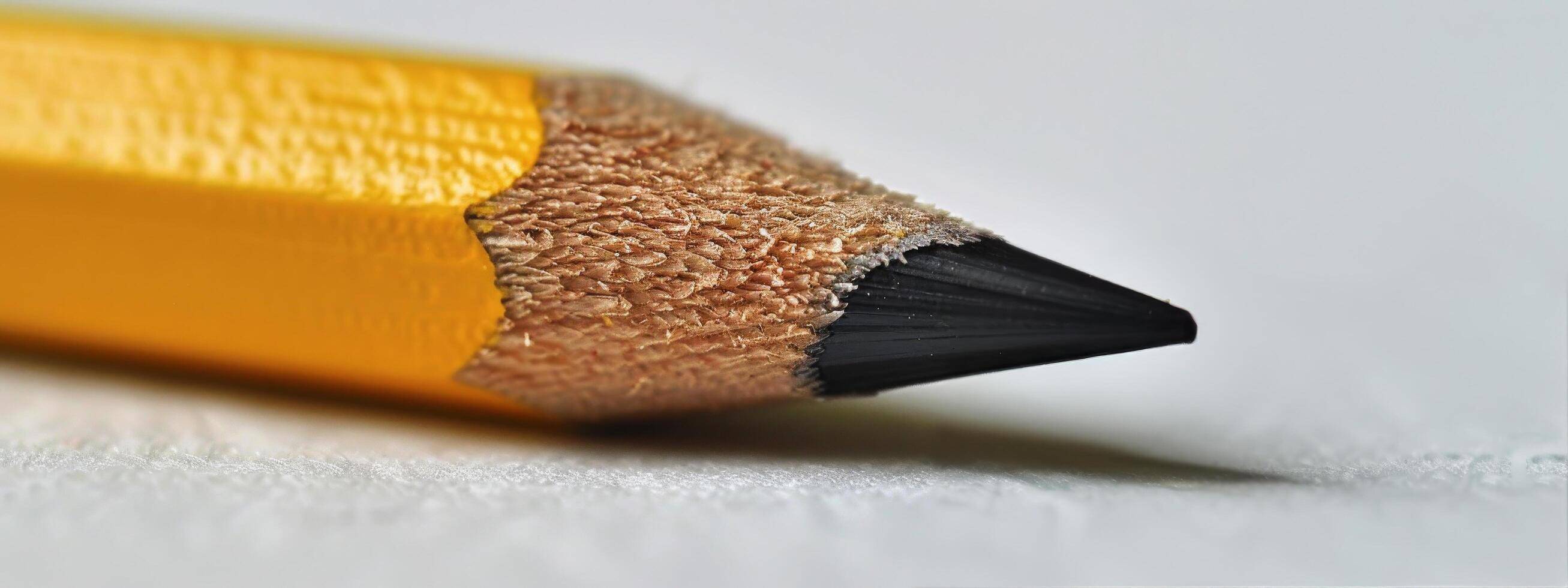 AI generated Close Up of a Yellow Pencil With a Black Tip photo