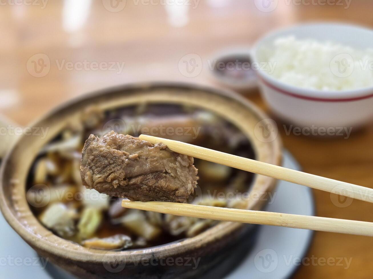 Buk Kut Teh, a Chinese pork soup dish, eat with rice and some vegetable, normally found in Southeast Asia. photo