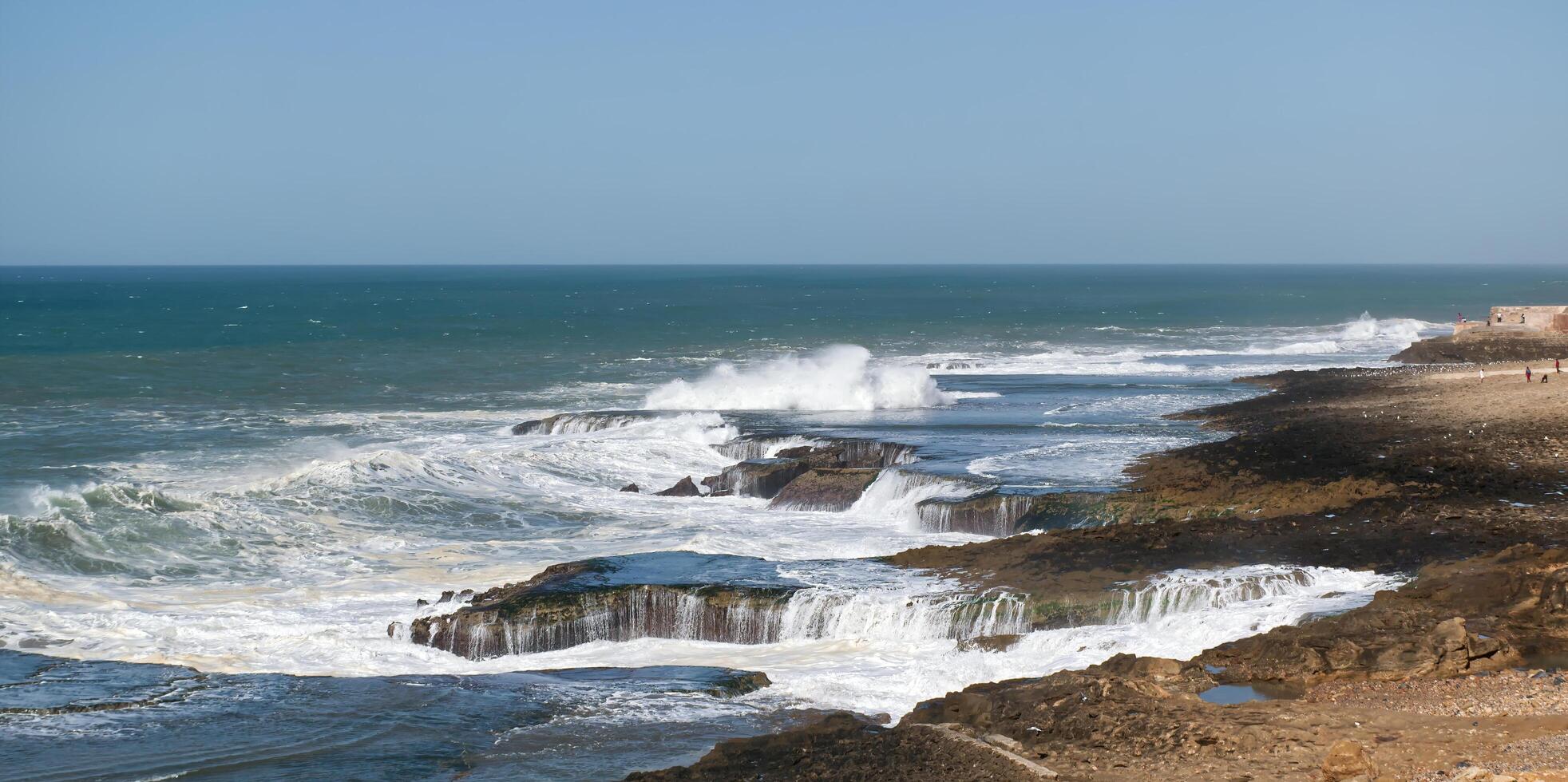 The waves of the Atlantic Ocean crashing on the shore of Morocco. Africa photo