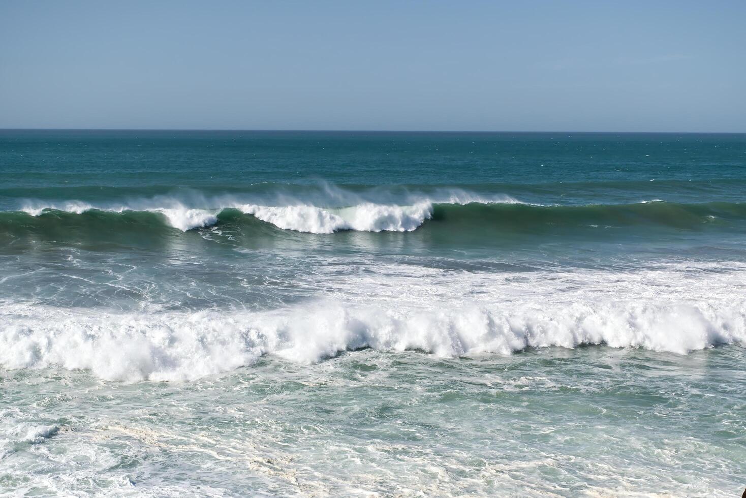 The waves of the Atlantic Ocean crashing on the shore of Morocco. Africa photo