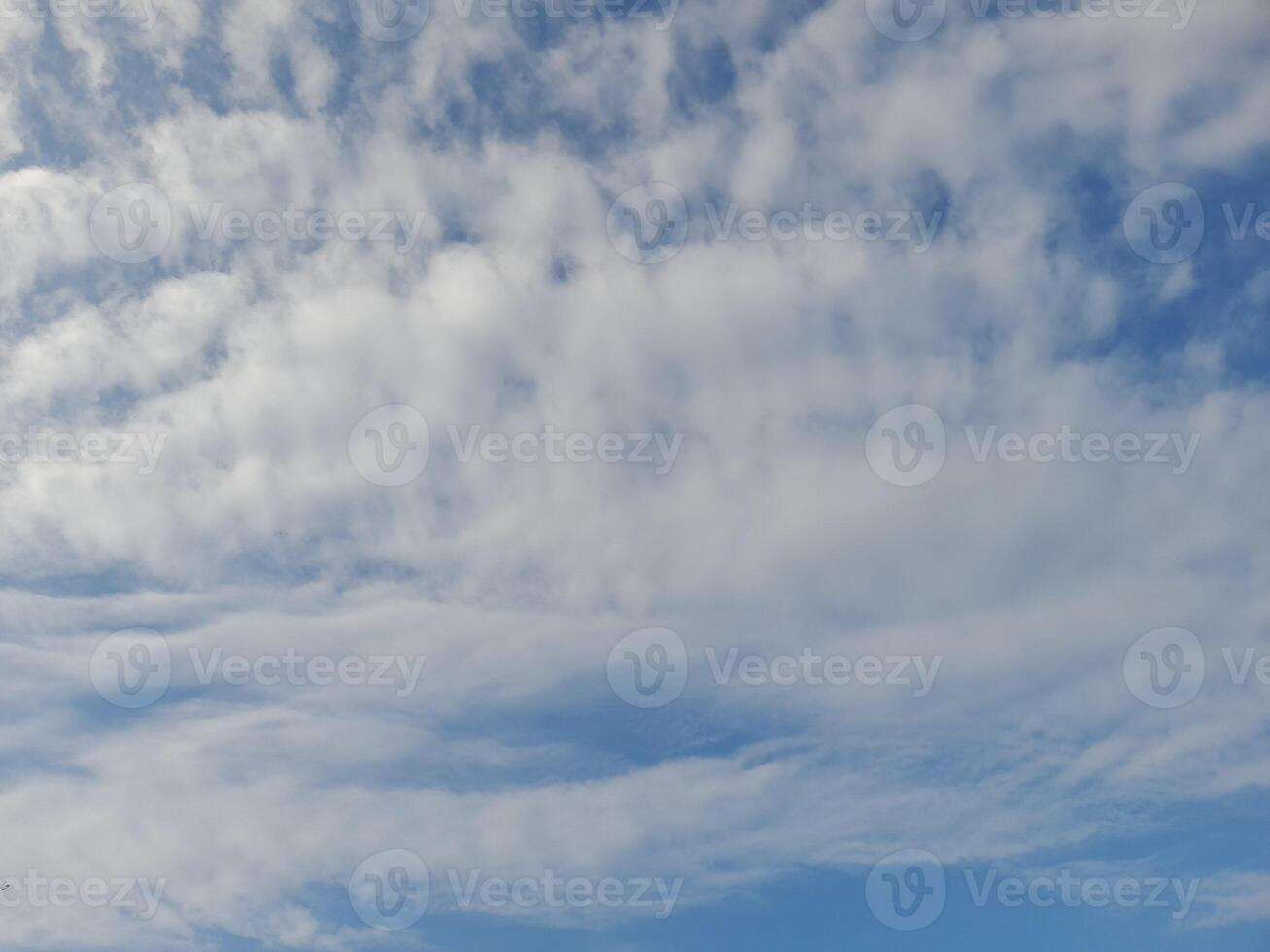 The white clouds on the blue sky are perfect for the background. Skyscape on Lombok Island, Indonesia photo