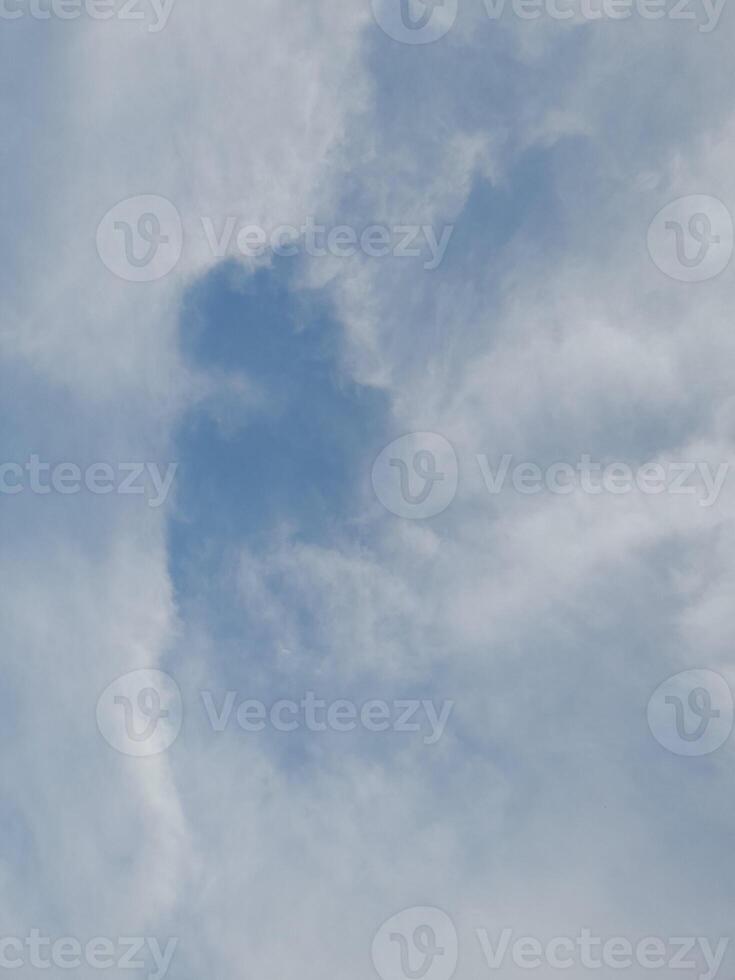 The white clouds on the blue sky are perfect for the background. Skyscape on Lombok Island, Indonesia photo