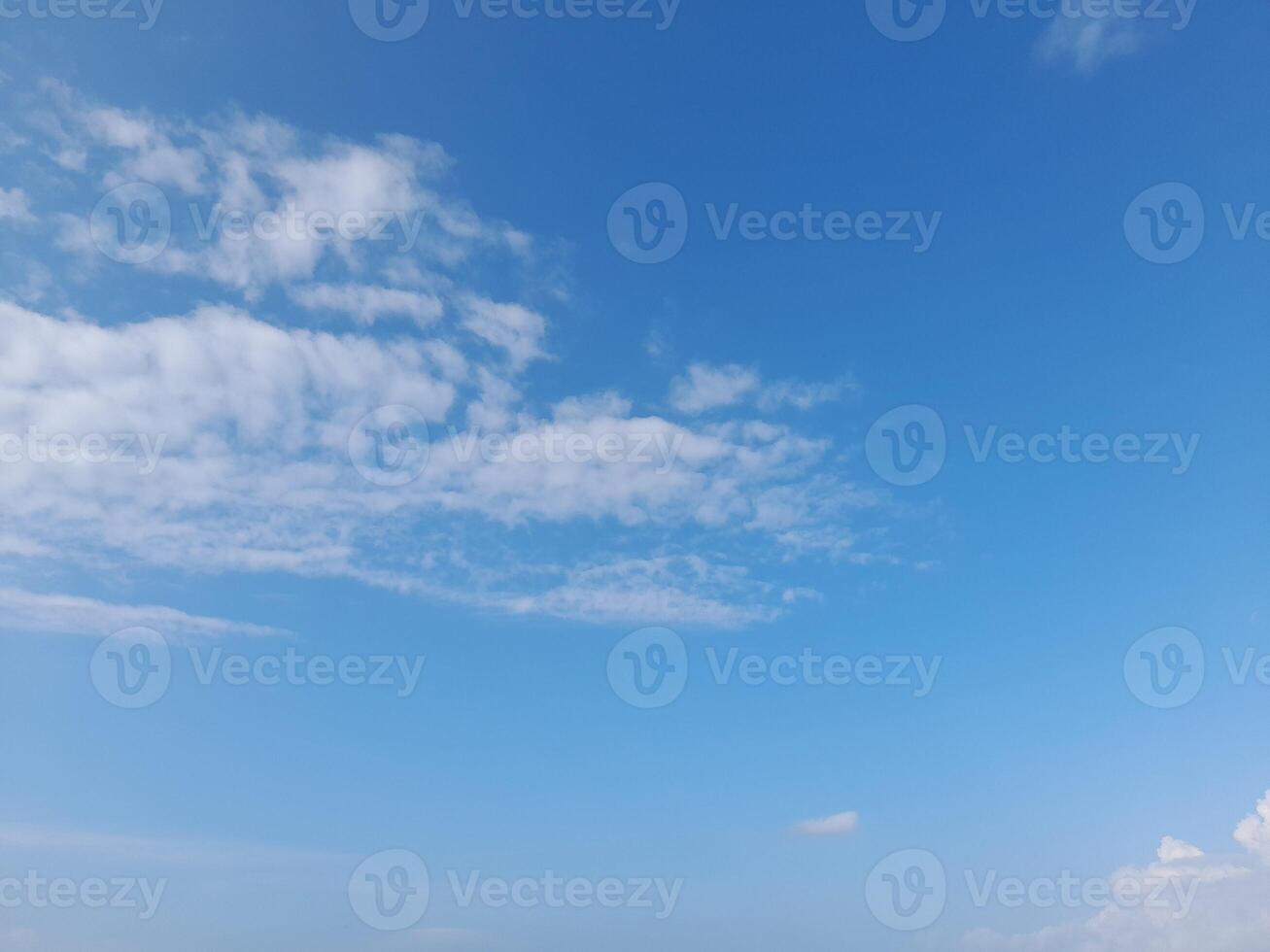 The white clouds on the blue sky are perfect for the background. Skyscape on Lombok Island, Indonesia photo