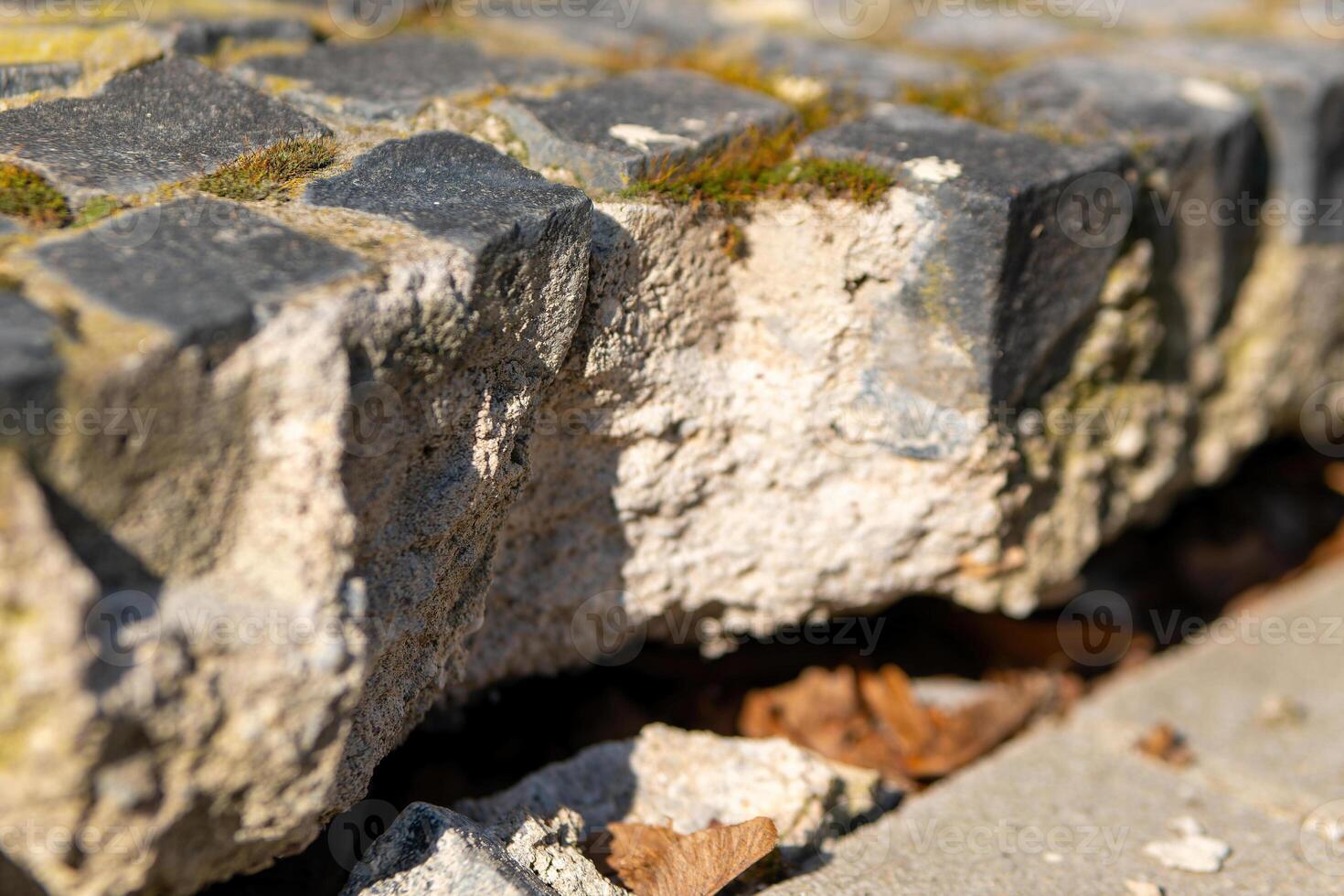 broken cobblestones in the sunshine photo