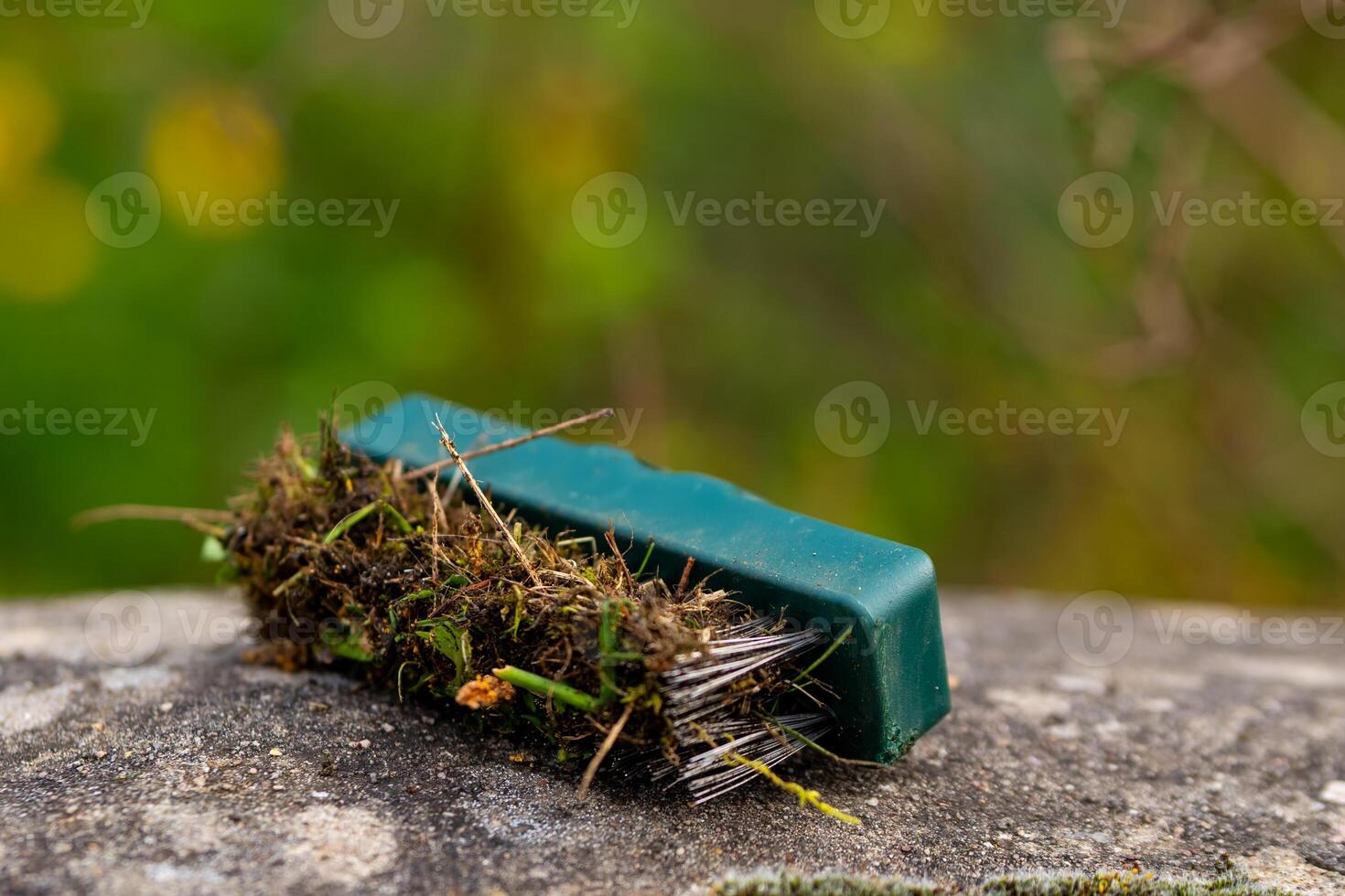 a dirty wire brush in selective focus photo