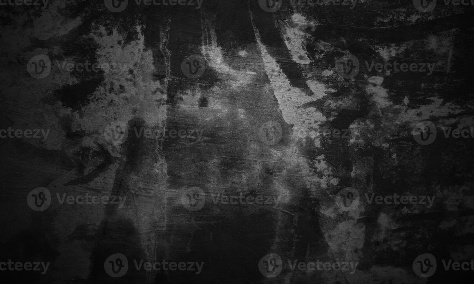 Black concrete texture as a concept of horror and Halloween. Dark wall background cement or stone. photo