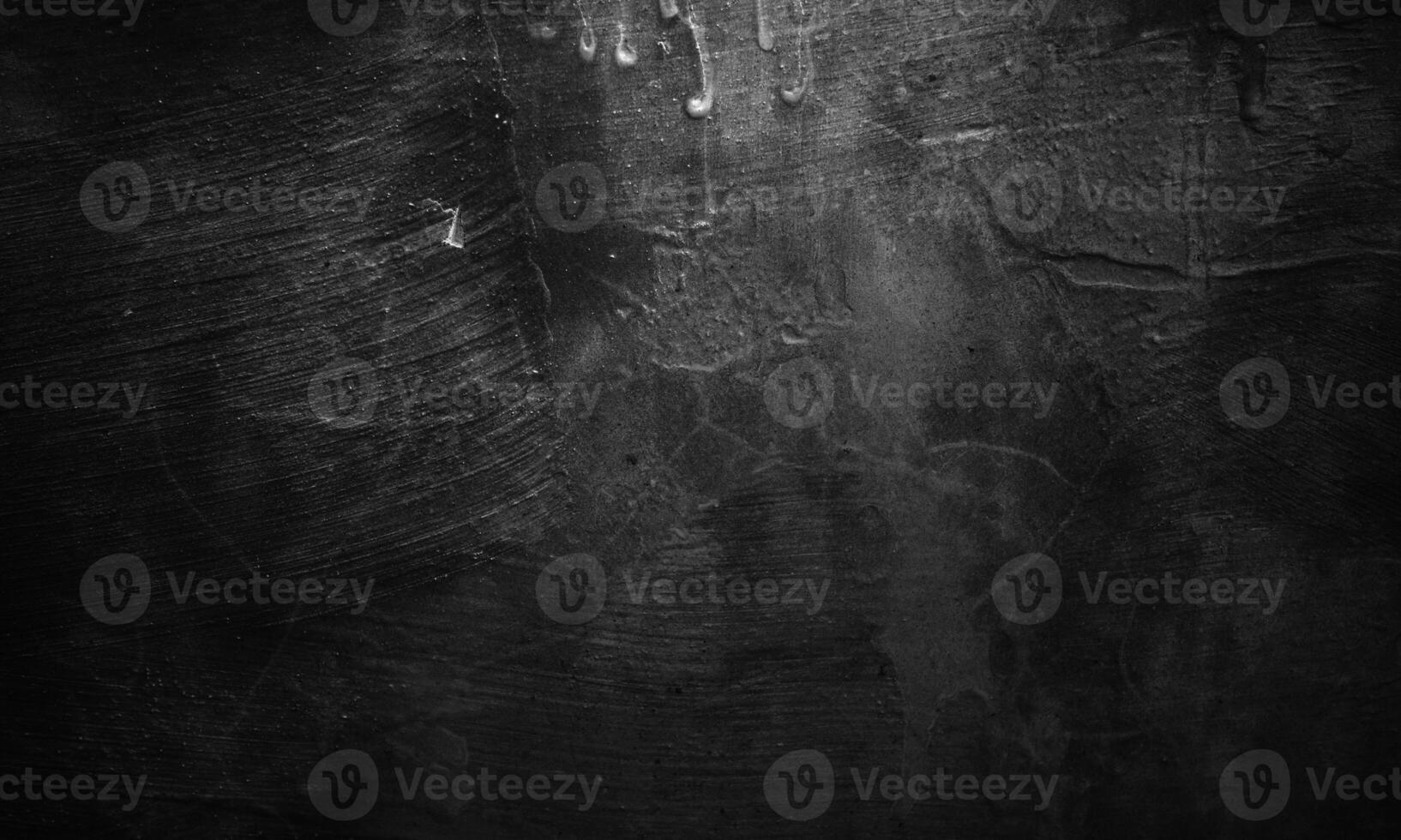 Black concrete texture as a concept of horror and Halloween. Dark wall background cement or stone. photo