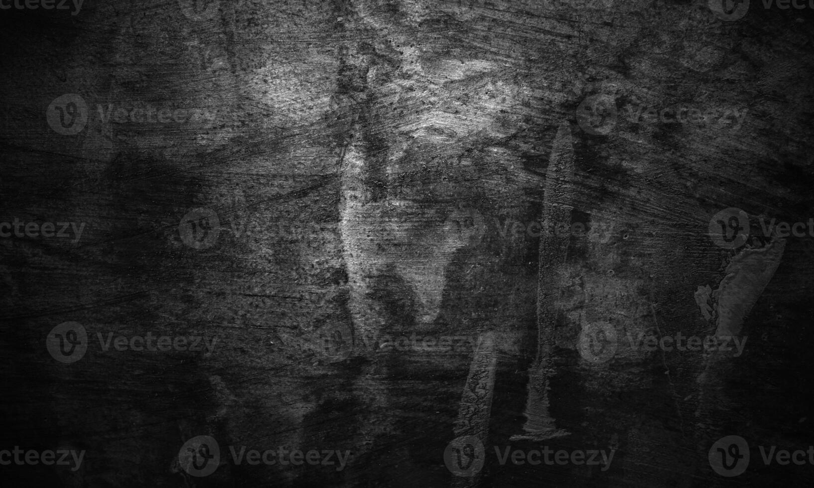 Black concrete texture as a concept of horror and Halloween. Dark wall background cement or stone. photo