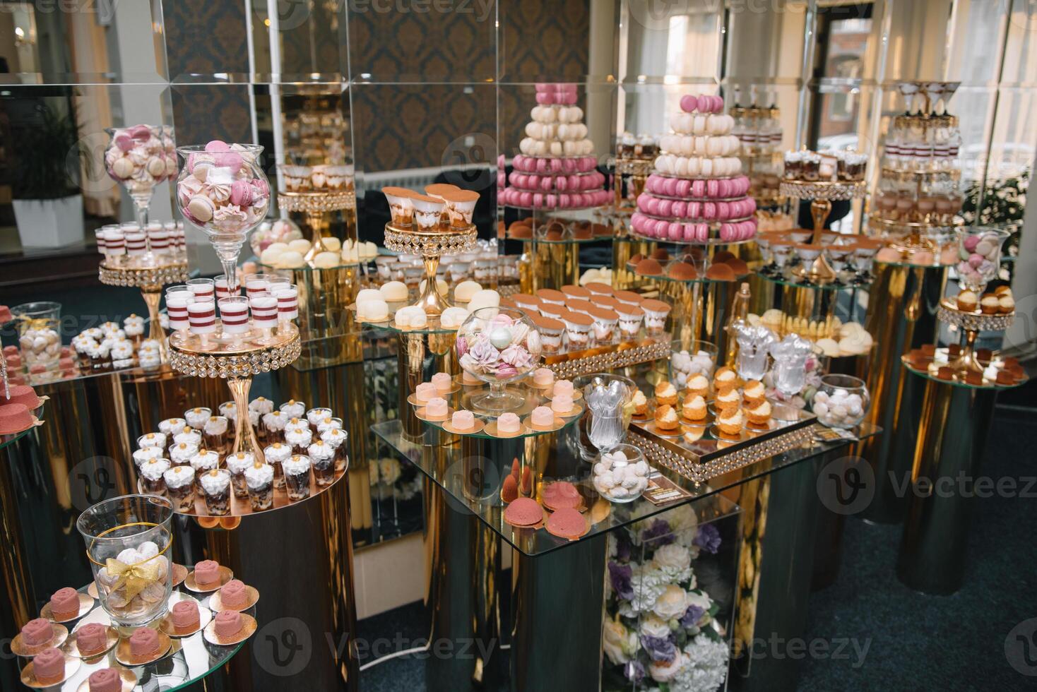 Delicious wedding reception candy bar dessert table. macaroon on candy bar, candy bar on holiday, candy bar at the wedding. photo