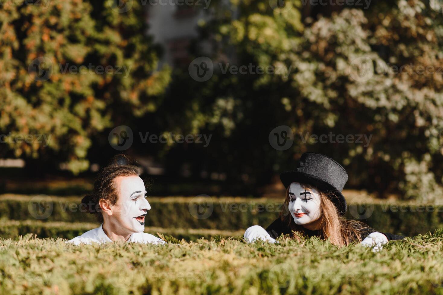 Street artists performing, Two mimes man and woman in april fools day photo