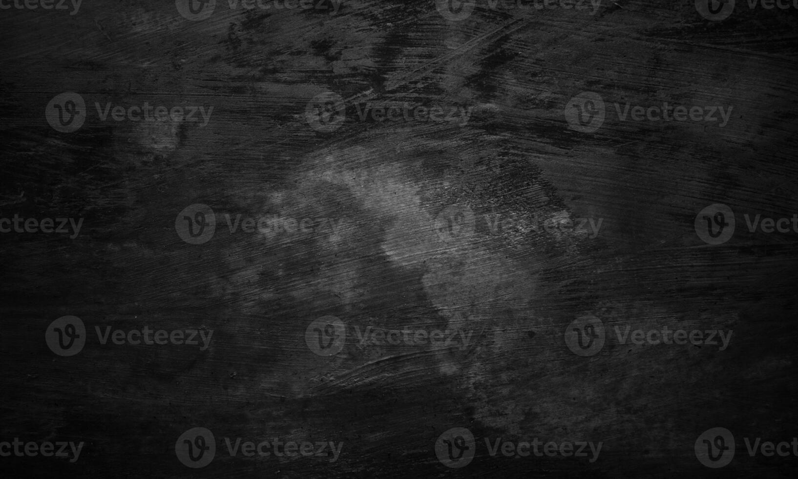 Black concrete texture as a concept of horror and Halloween. Dark wall background cement or stone. photo