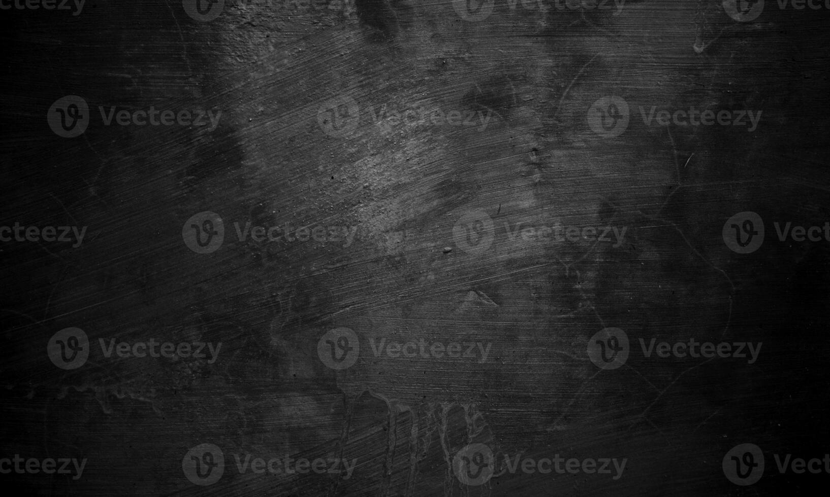 Black concrete texture as a concept of horror and Halloween. Dark wall background cement or stone. photo