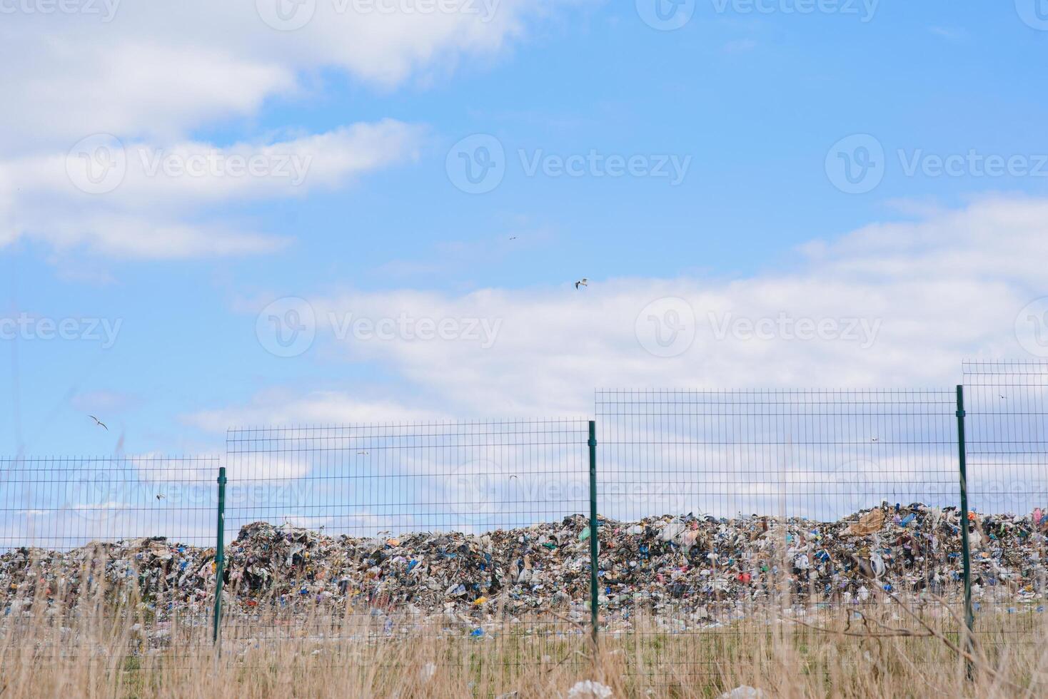 Mountain garbage, large garbage pile, degraded garbage. Pile of stink and toxic residue. These garbage come from urban areas, industrial areas. Consumer society Cause massive waste. Can not get rid of photo