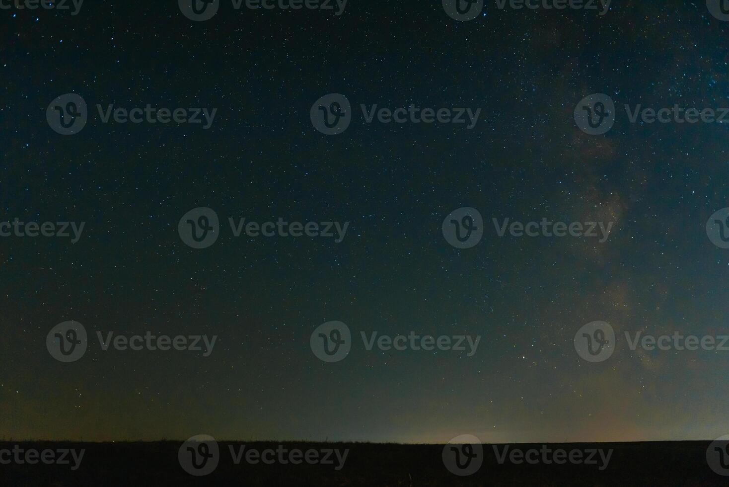 Blue dark night sky with many stars. Space background photo
