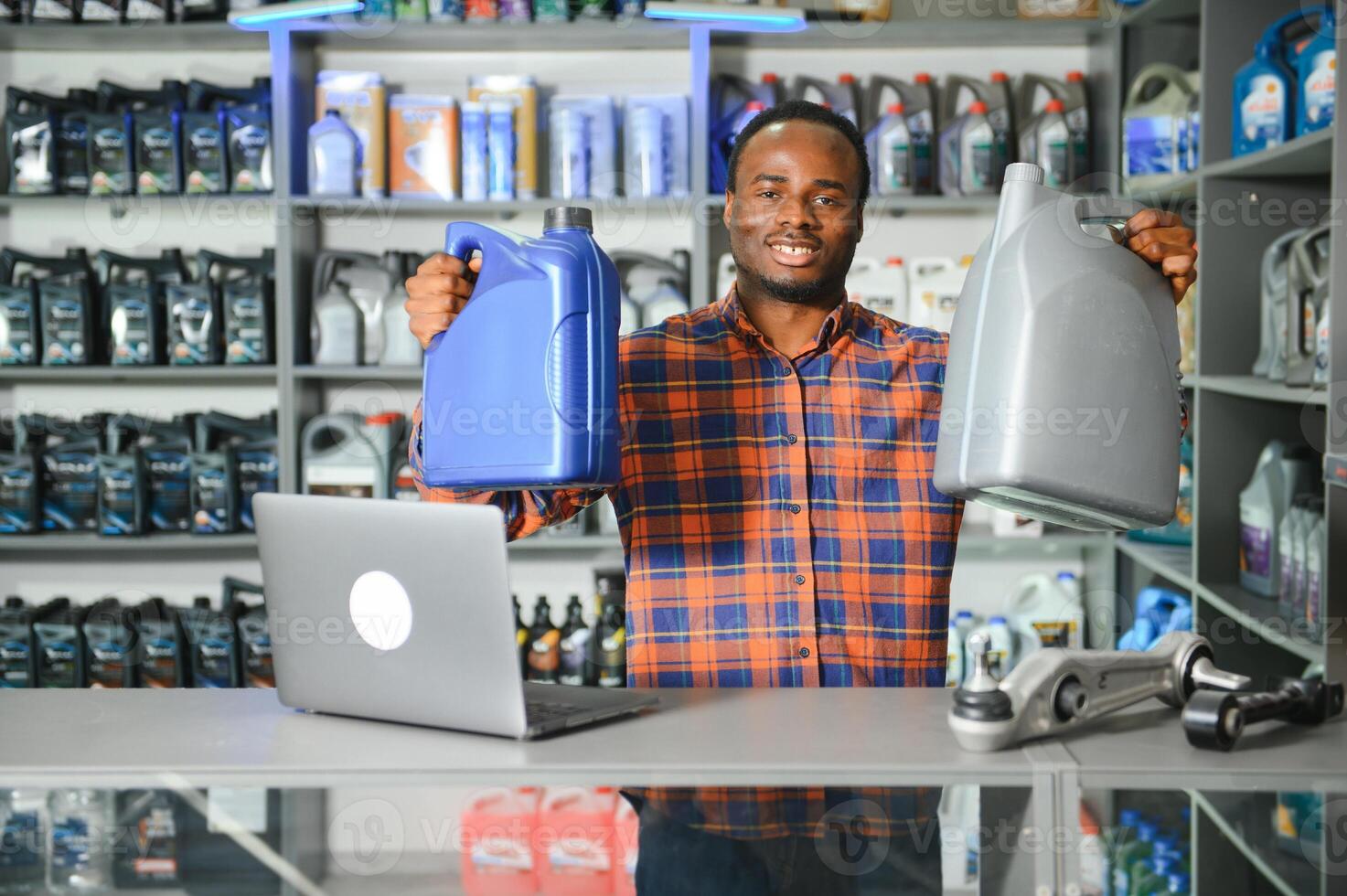Smiling african Salesman Auto Parts Store photo