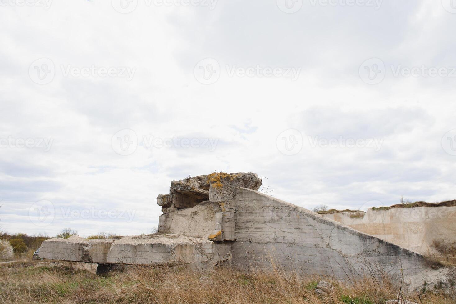 the ruins of german bunker in the beach of Normandy, France photo