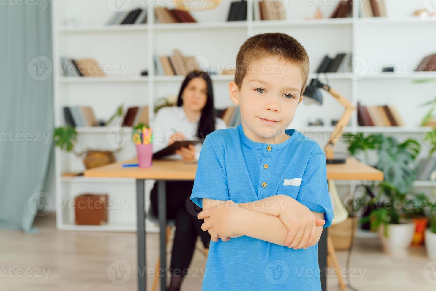 The concept of child psychology. A boy at the psychologist photo