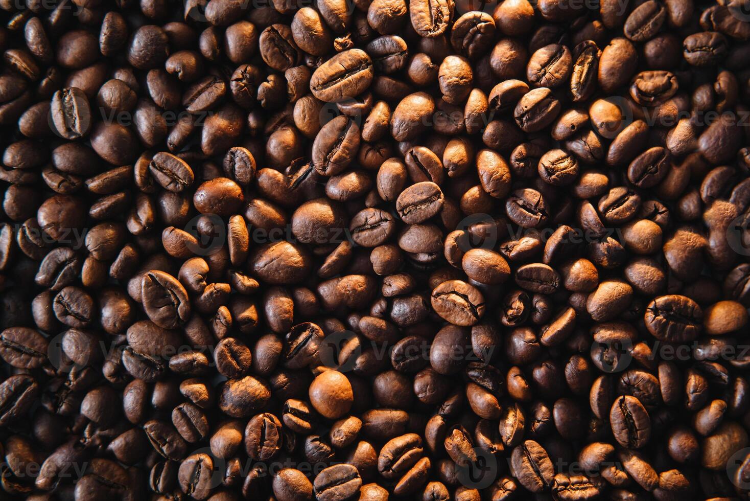 The Roasted coffee beans background. photo