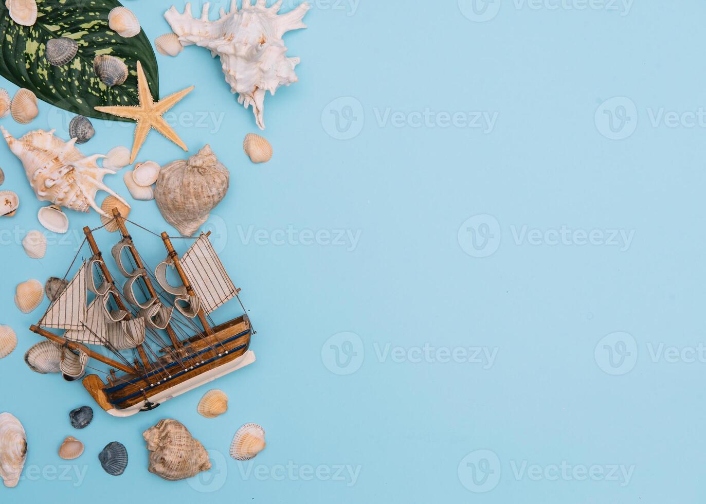 Travel accessories on blue background, travel concept. Top view with copy space photo