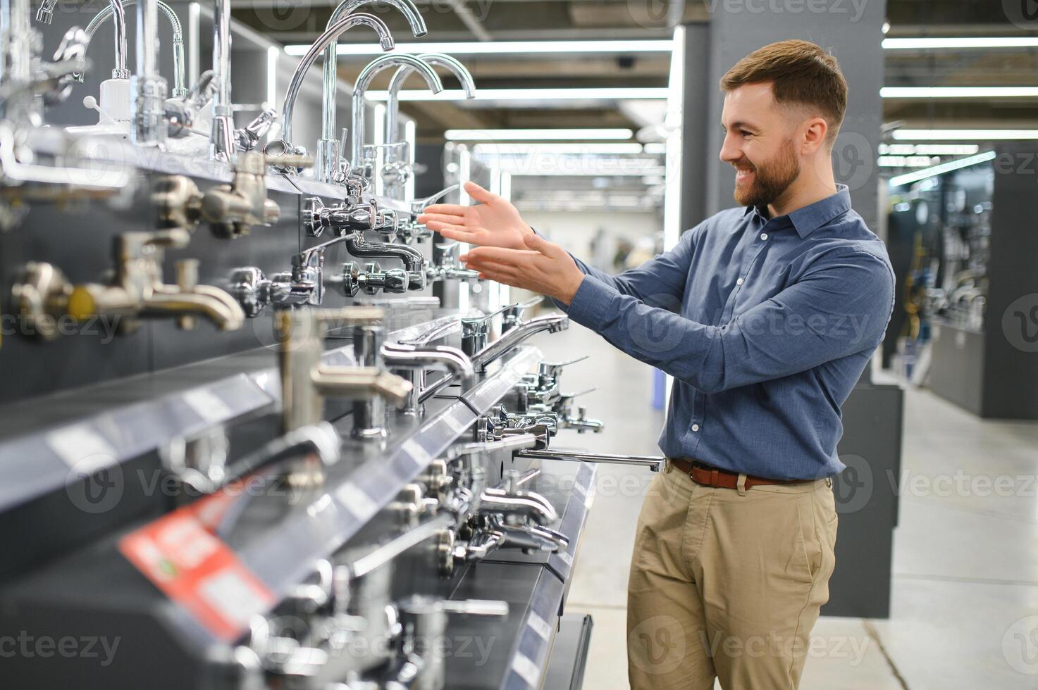 Man chooses a products in a sanitary ware store photo