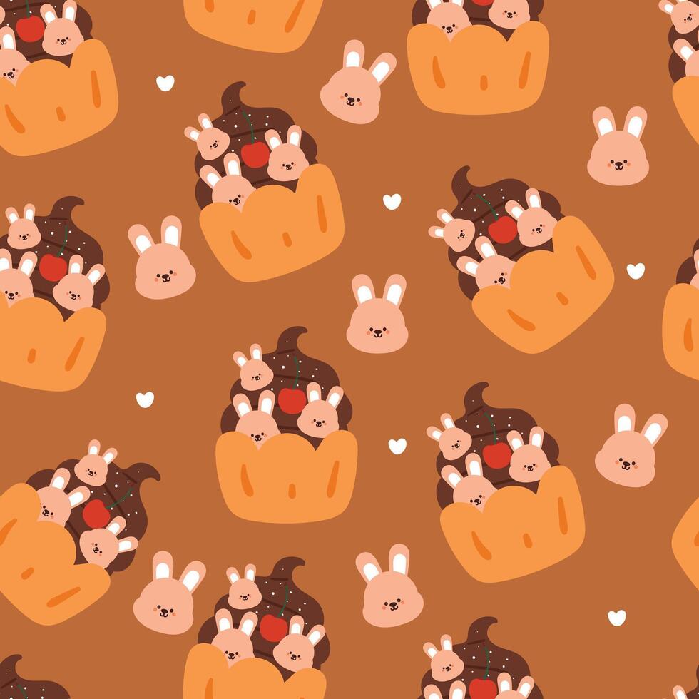 seamless pattern cartoon bunny and cupcake. cute animal wallpaper for textile, gift wrap paper vector