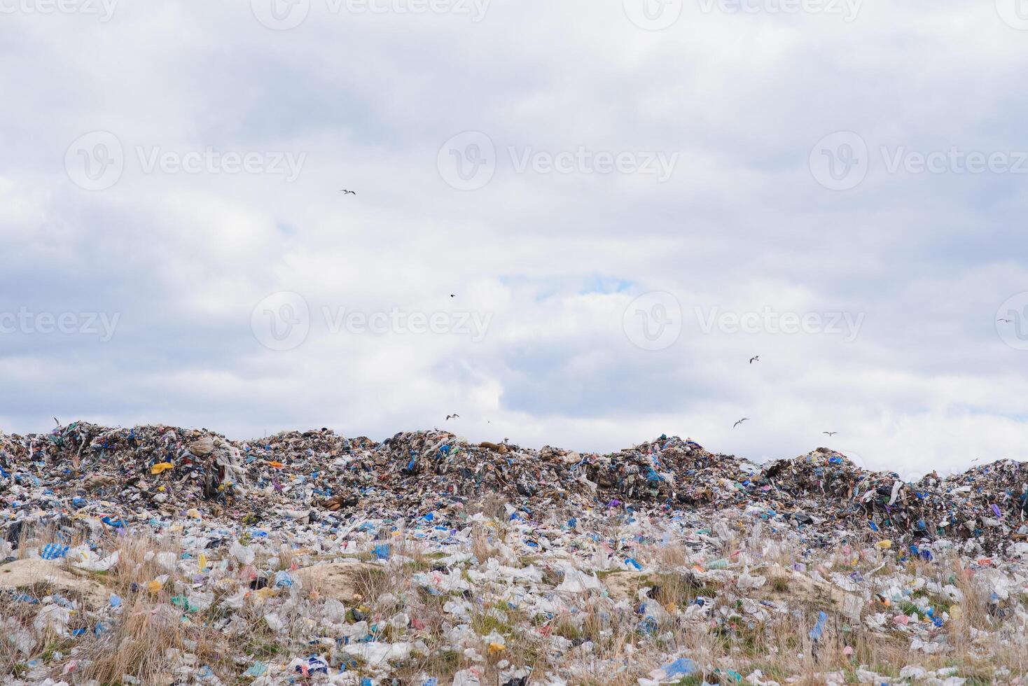 Mountain garbage, large garbage pile, degraded garbage. Pile of stink and toxic residue. These garbage come from urban areas, industrial areas. Consumer society Cause massive waste. Can not get rid of photo