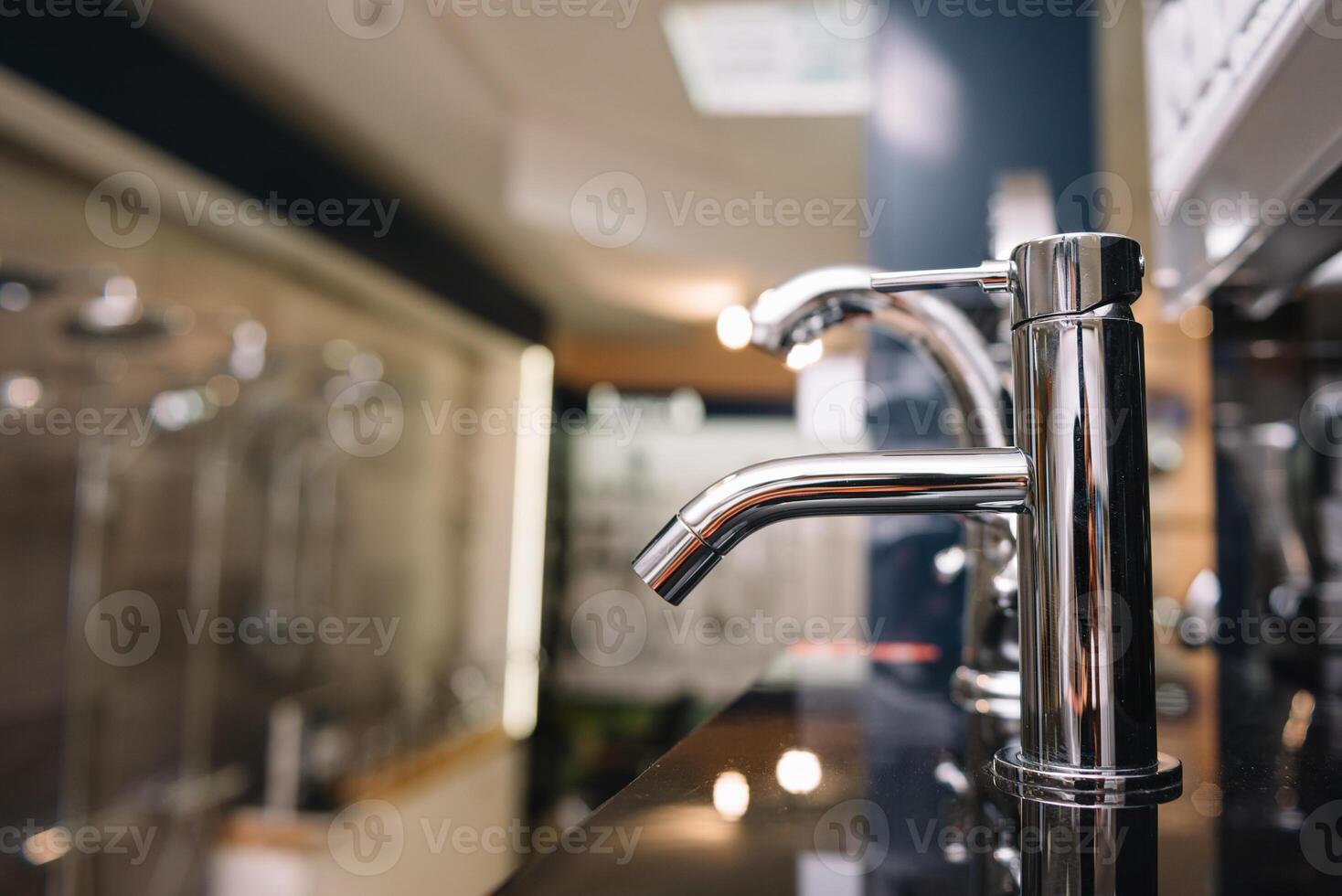 Rows of new faucets in plumbing shop, closeup. photo