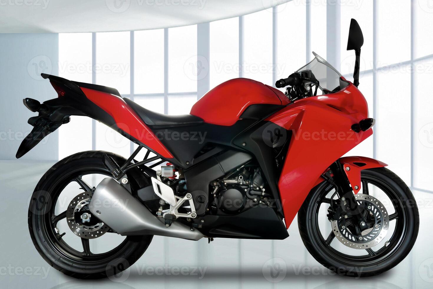 full side view of red sports type motorbike with fuel injection system, 250 cc engine, photo