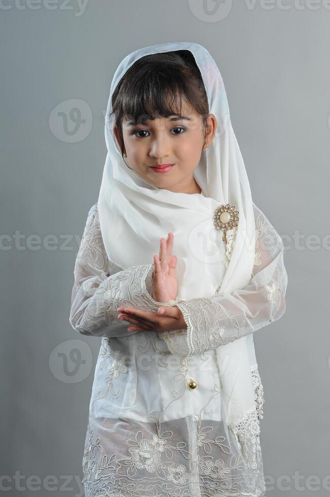 A Young Asian girl wearing Javanese Traditional Clothes photo