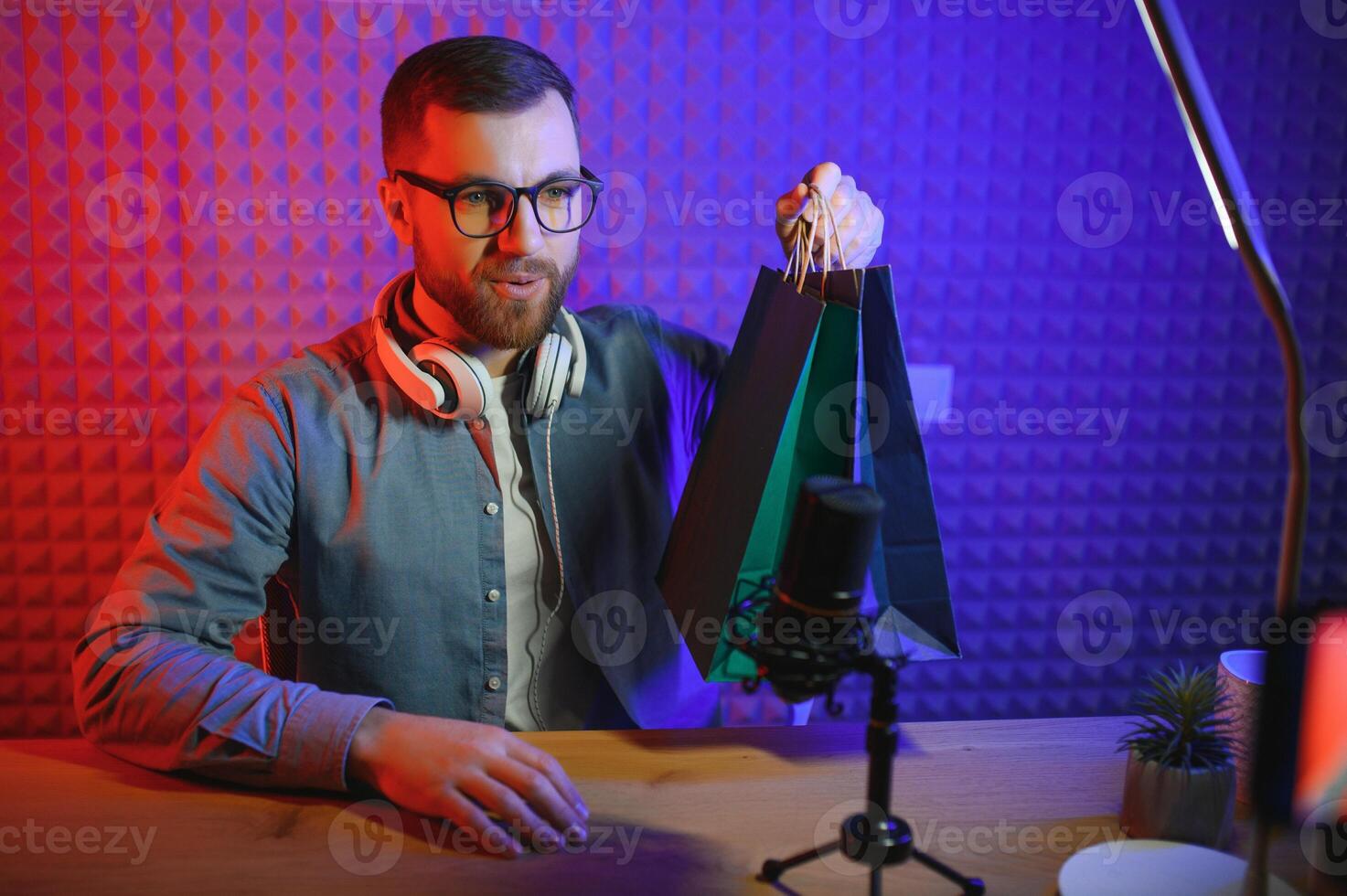 Young blogger with recording video photo