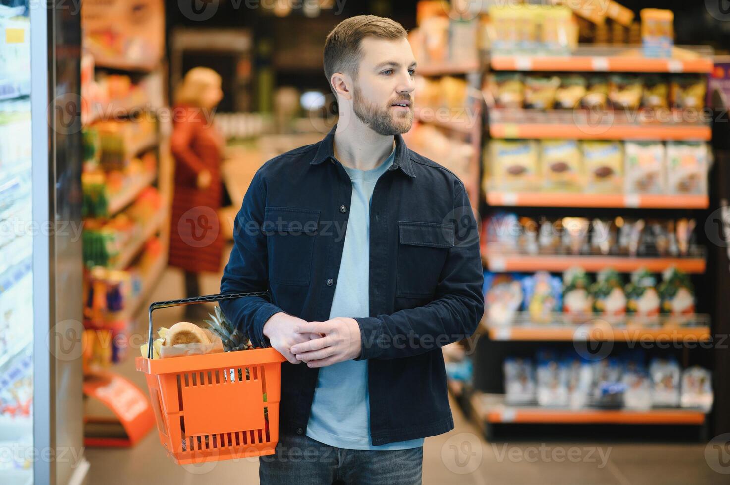 man in supermarket, grocery store customer photo