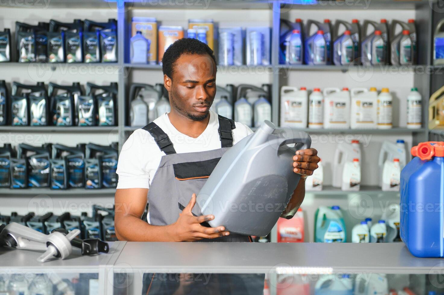 Smiling african Salesman Auto Parts Store photo