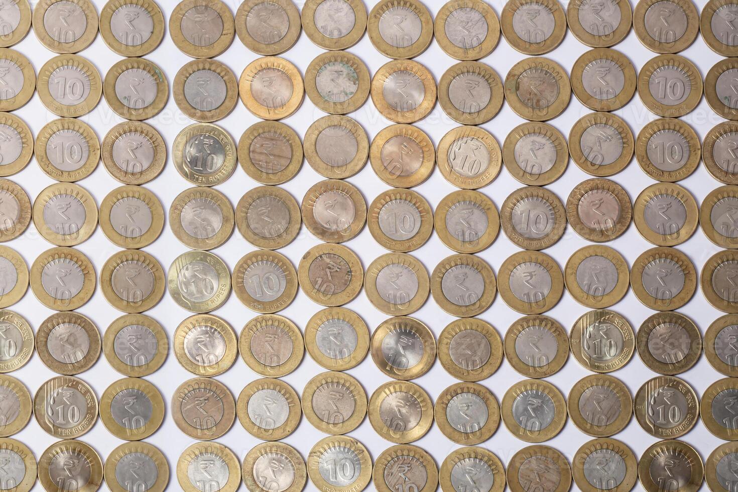 various Indian ten rupee coins background. Top view photo