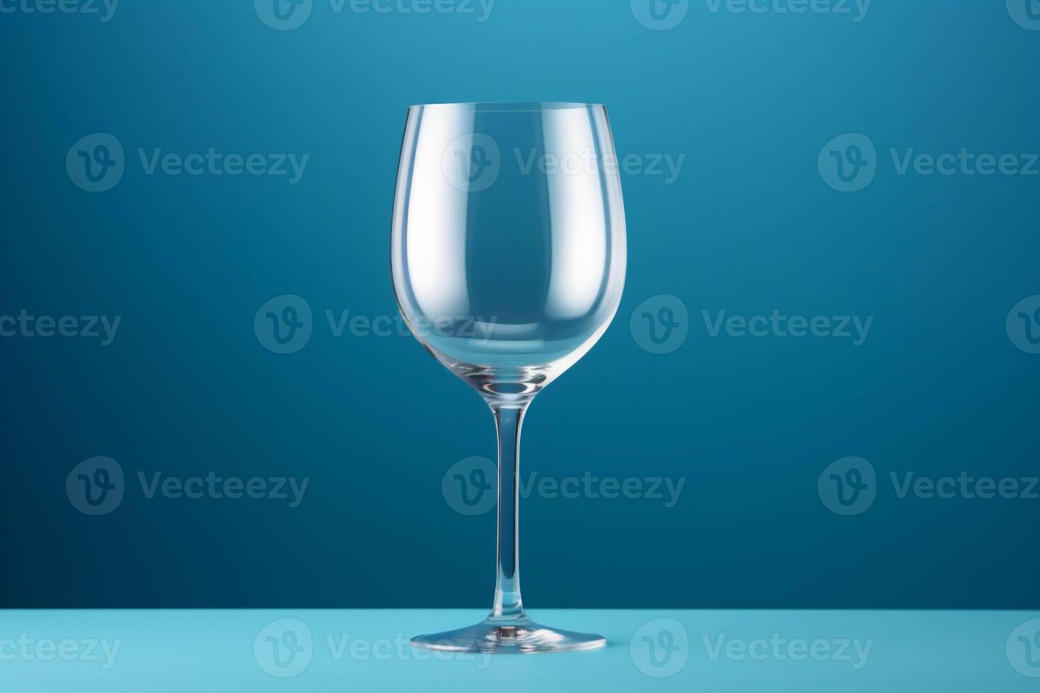 AI generated A single isolated wine glass on a blue surface and background. Copy space. photo