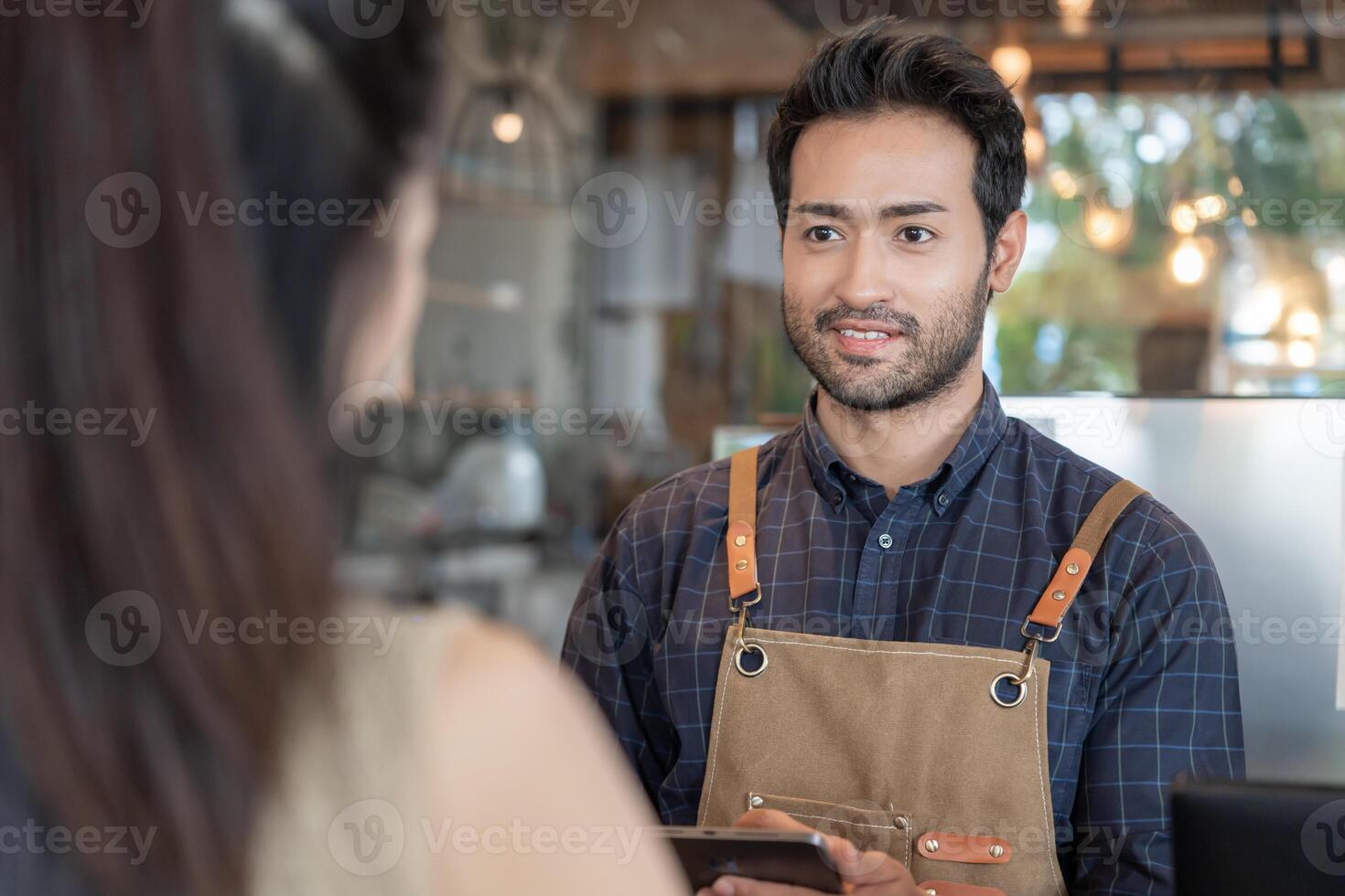 Asia man owner happy smile and send order to customer. guarantees safety, cleanliness, open the coffee shop. open for New normal. Small business, welcome, restaurant, home made, cafe photo