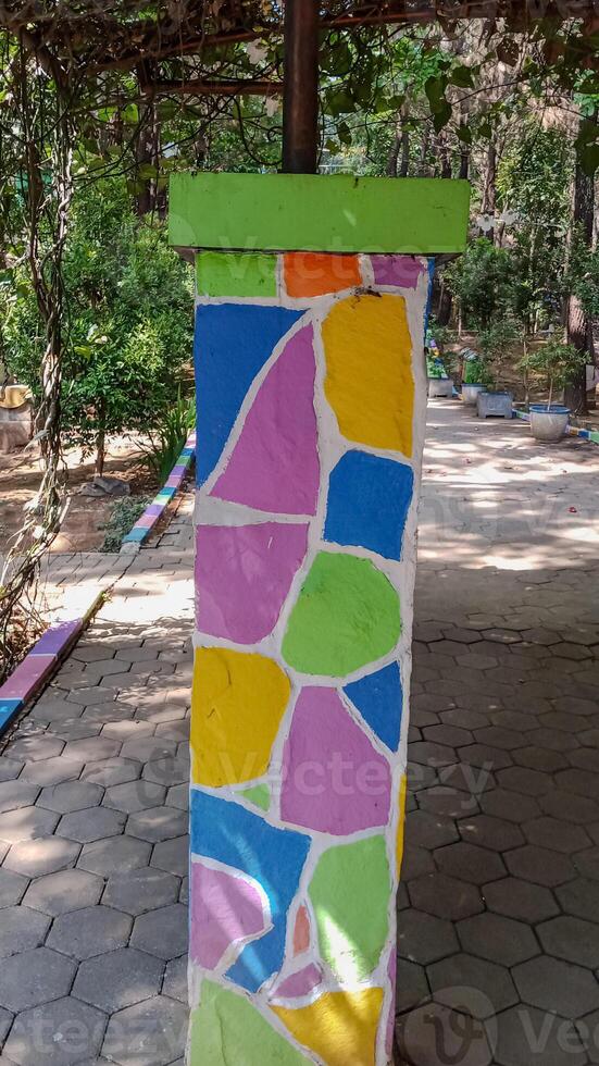 colorful geometric pattern mural pillars photo