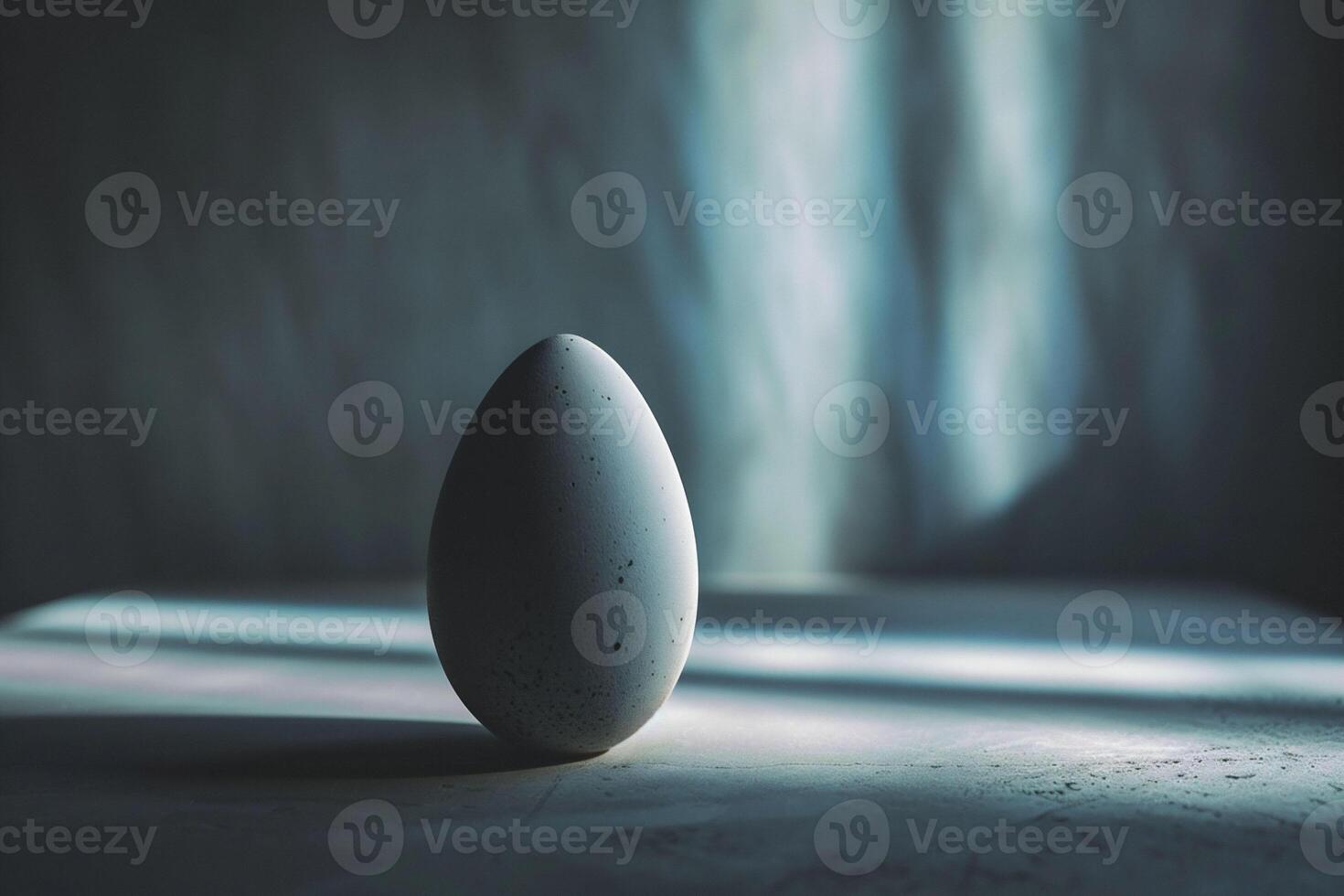 AI generated One speckled egg stands centered against a cool toned backdrop, embodying minimalism and the quiet anticipation of Easter. Copy space photo