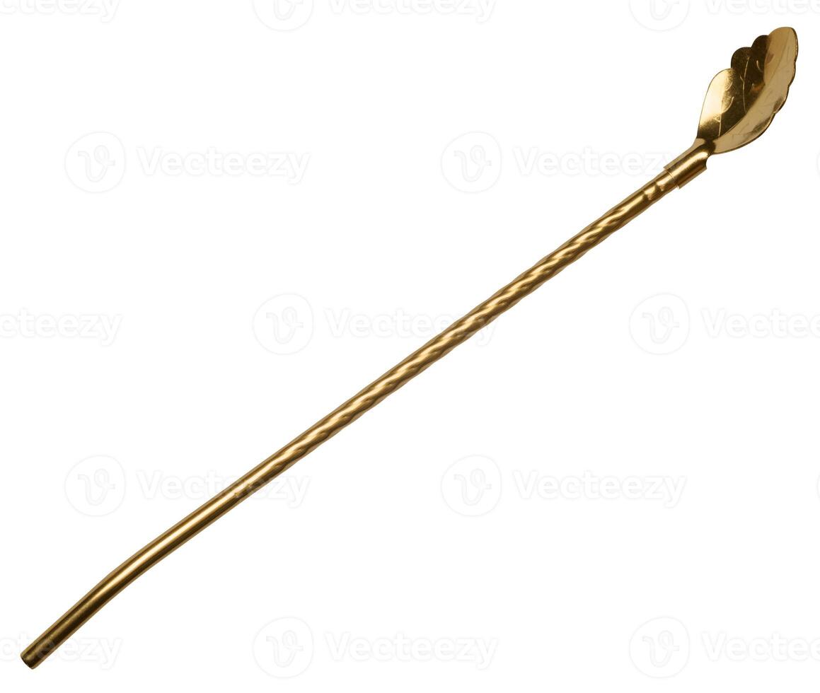 Golden cocktail spoon straw on isolated background photo