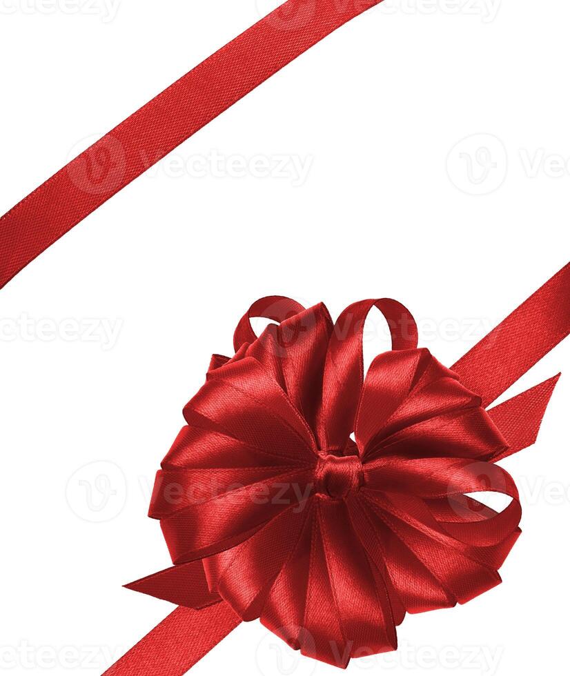 Tied bow made of red silk ribbon on an isolated background, decor for a gift photo