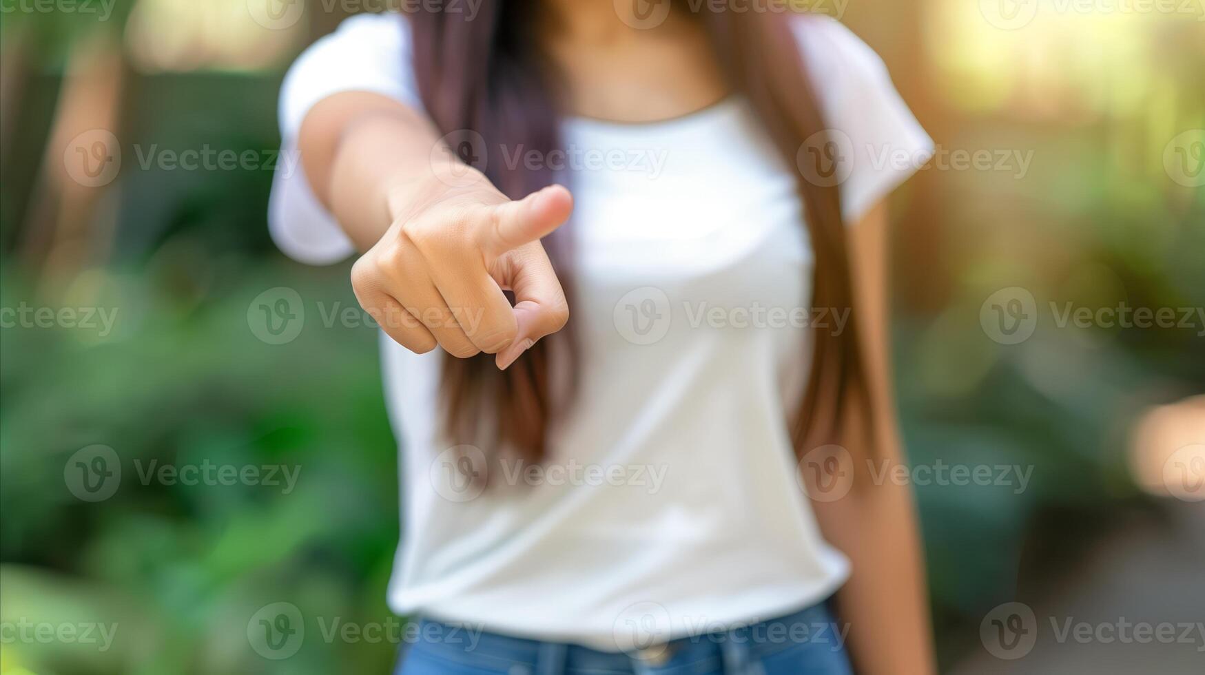 AI generated Young woman pointing finger at camera in nature photo