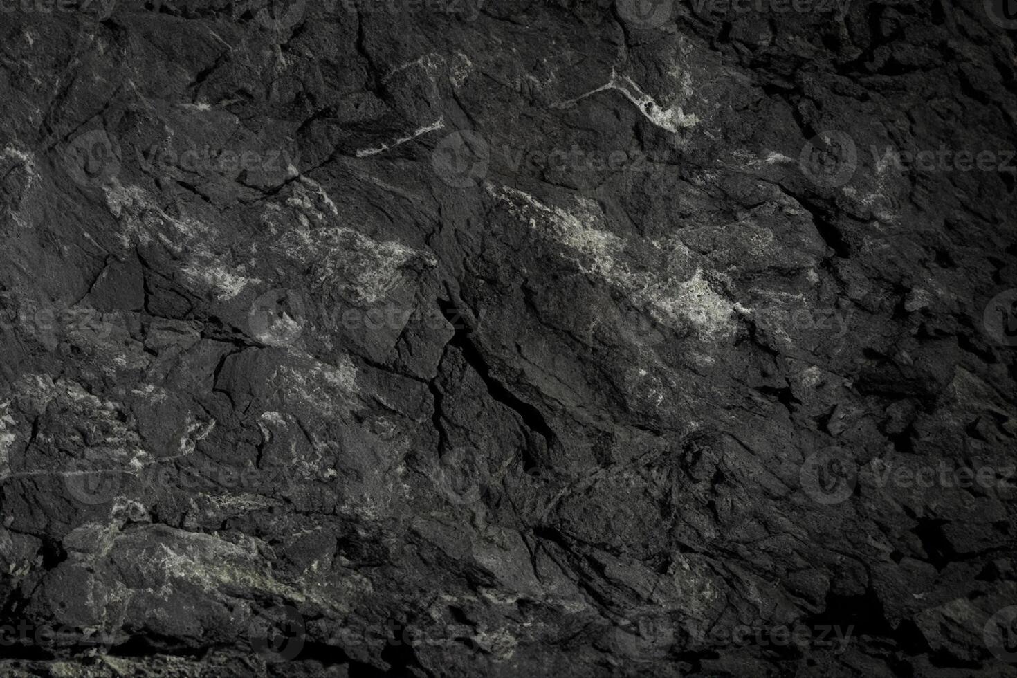 Versatile Rough Black Stone Wall Texture, Perfect for Wallpaper or Background Use. photo
