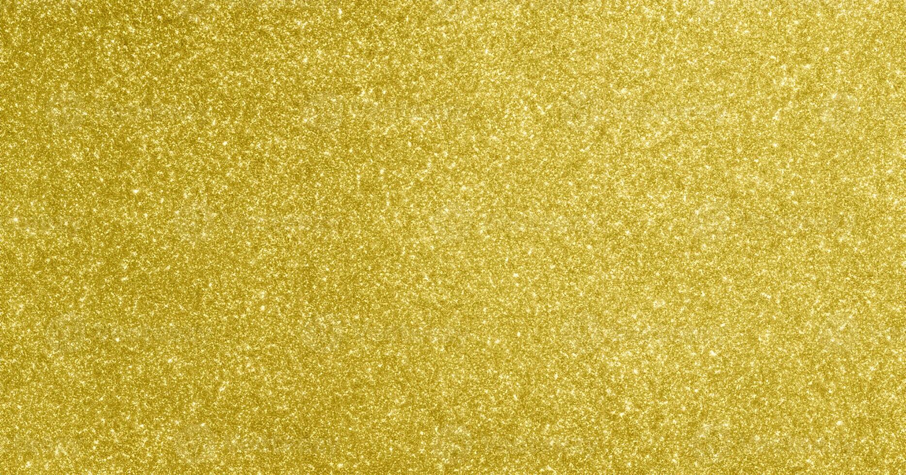 Glimmering Gold, Abstract Bokeh Lights with Sparkling Glitter. photo