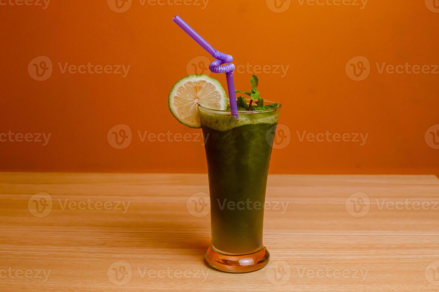 Mint Lemonade served in glass isolated on table top view bangladeshi drink photo