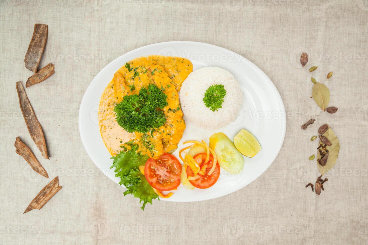 Machli methi malai curry or sweet fish curry, fish masala and fish karahi with rice served in a dish isolated on table top view of indian spices food photo