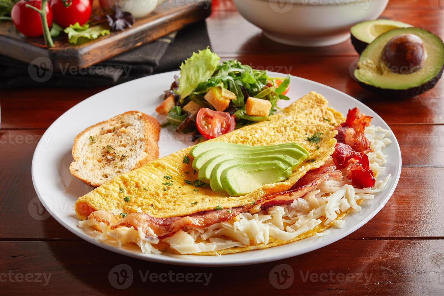California omelette roll and salad served in a dish isolated on wooden background side view photo