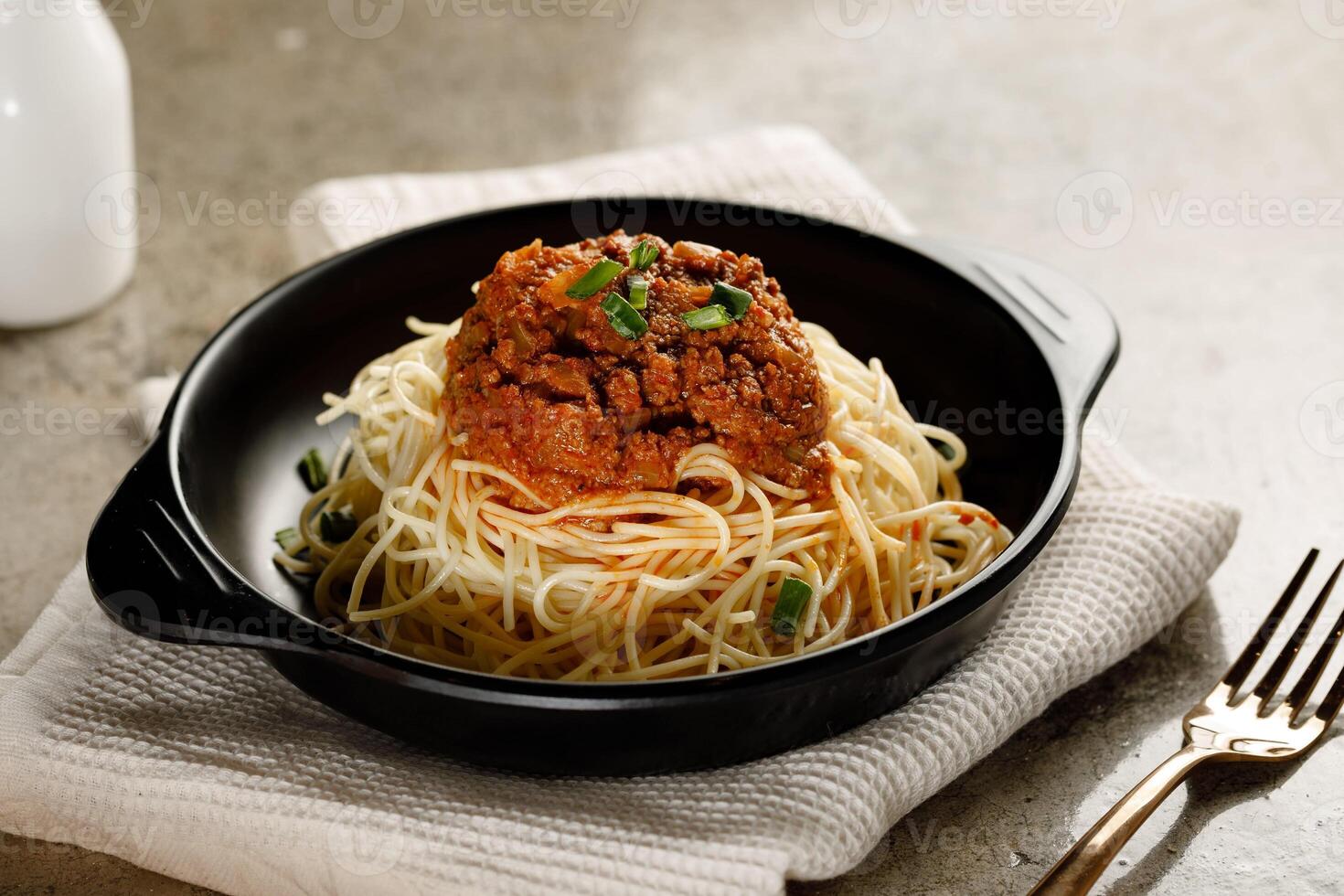 Spaghetti Bolognese Beef served in a dish isolated on grey background side view fast food photo