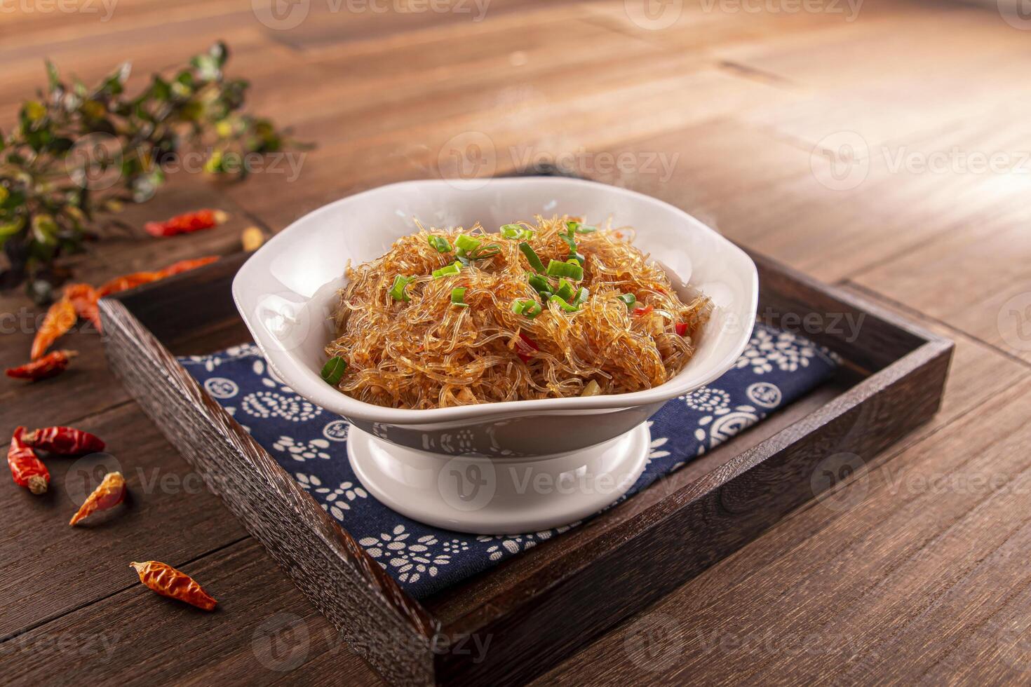 Spicy ants on the tree noodles served dish isolated on wooden table top view of Hong Kong food photo